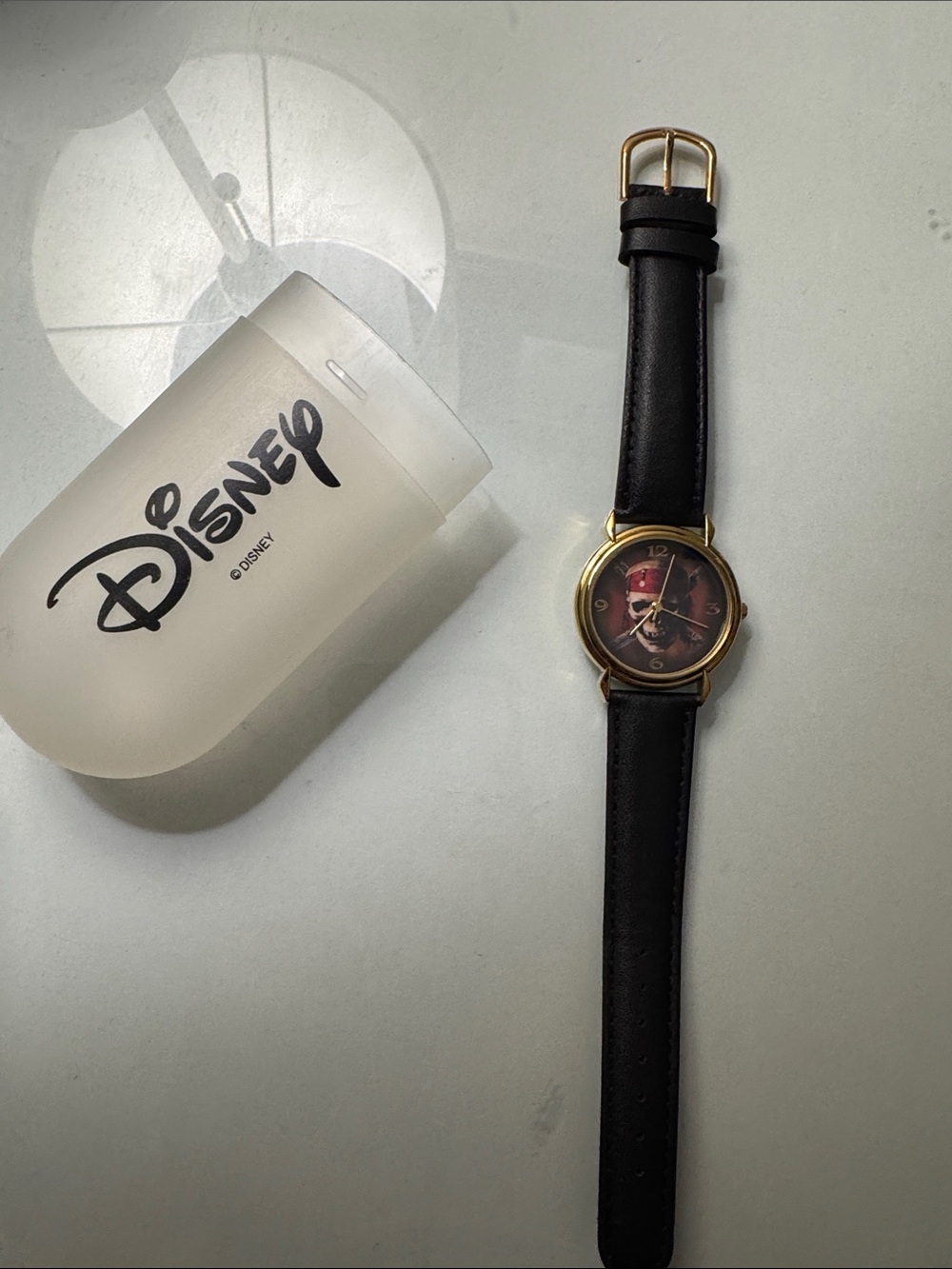 Disney Black Strap Watch with Gold Case and Red Dial Accent